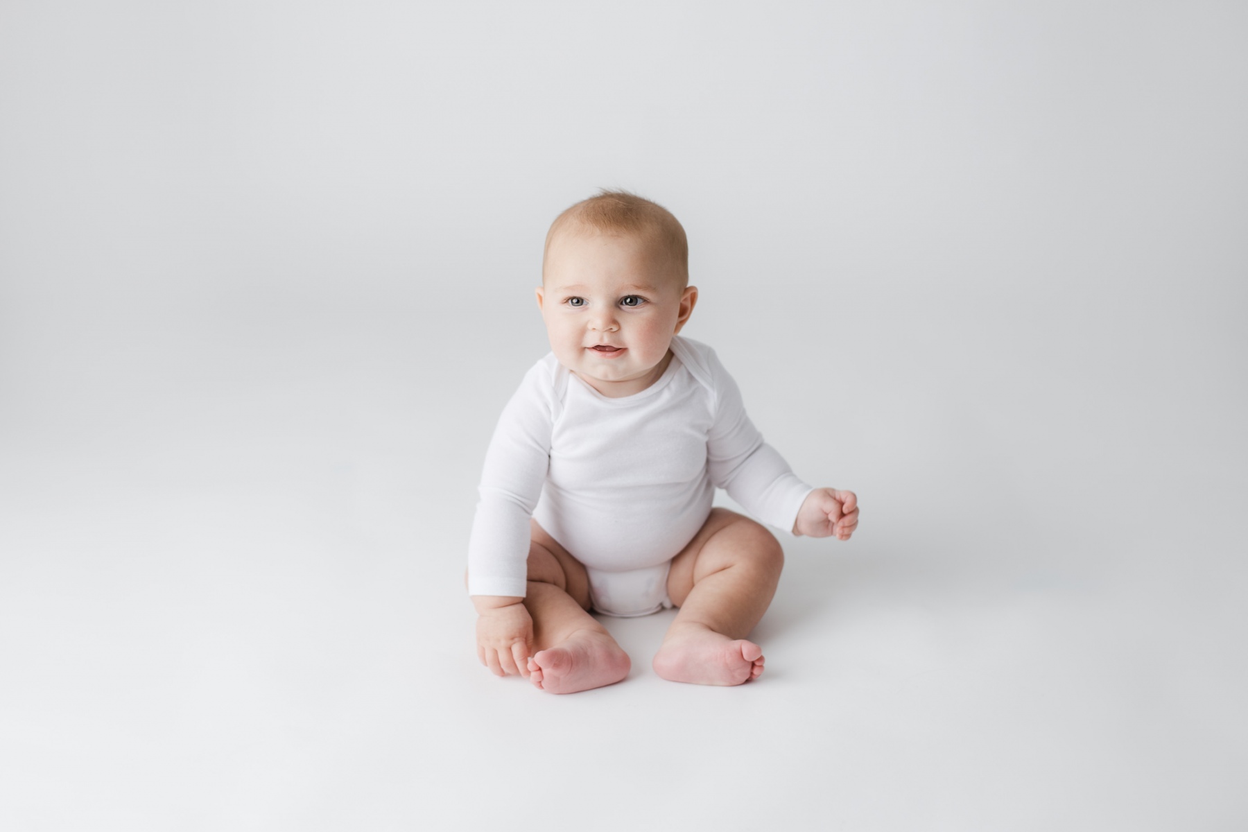 Premium Photo | Sweet Baby Poses For Camera