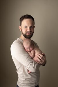 newborn studio picture with dad