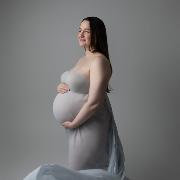 maternity portrait with flowing fabric