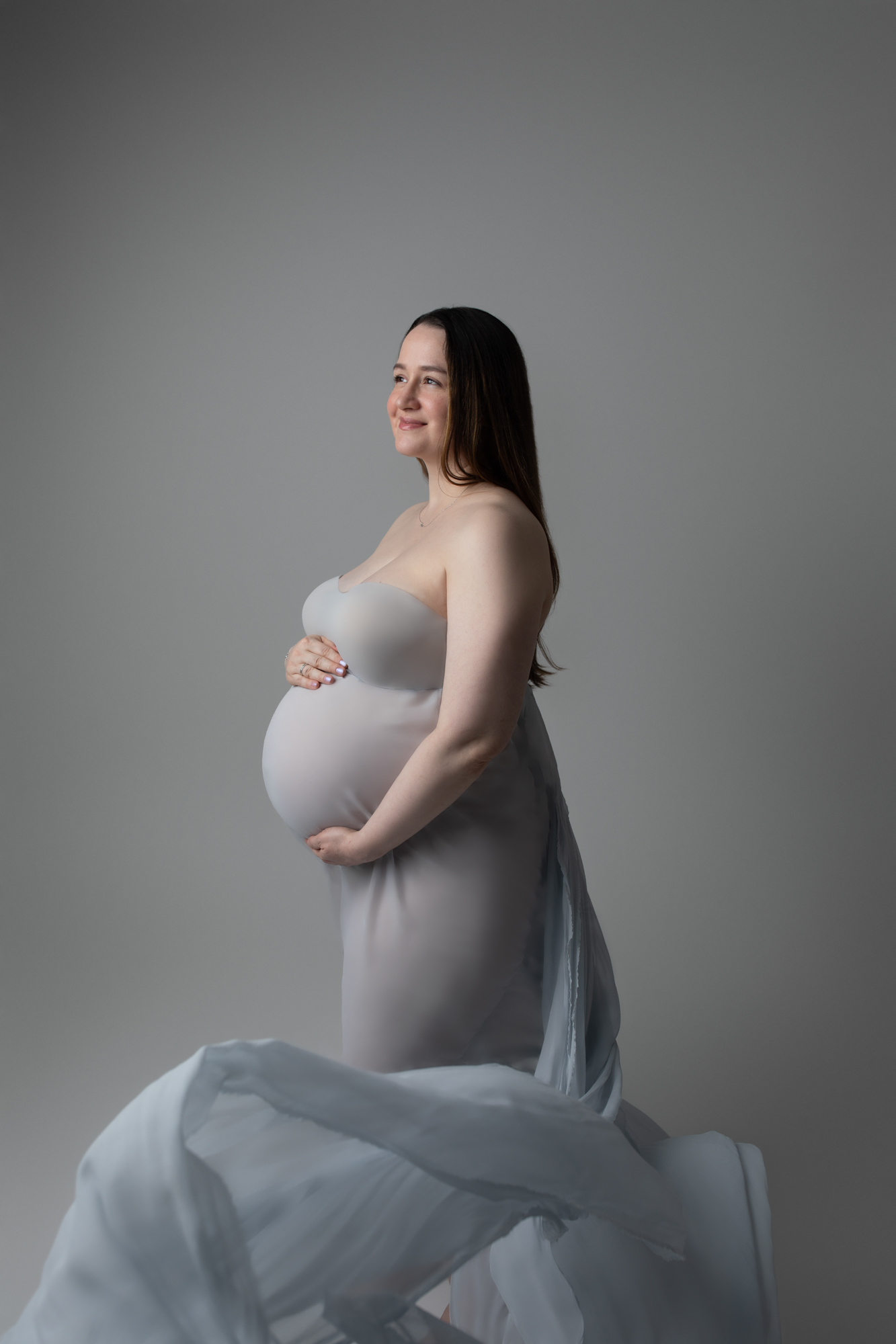 maternity portrait with flowing fabric