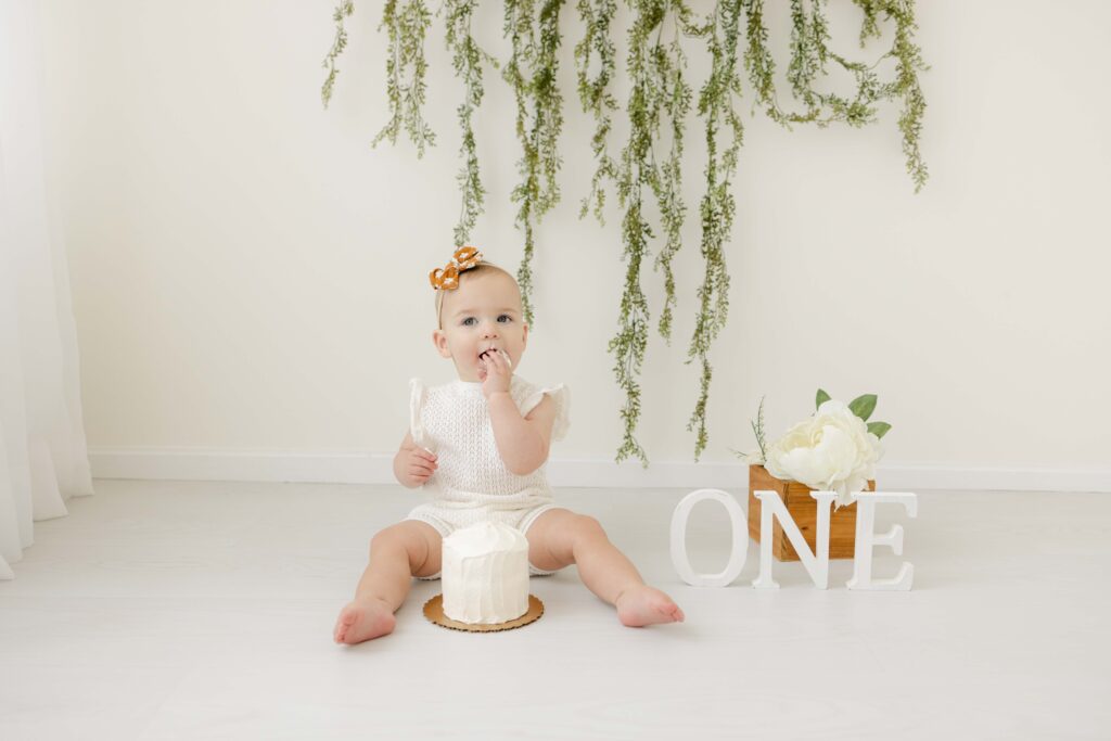 baby eating cake